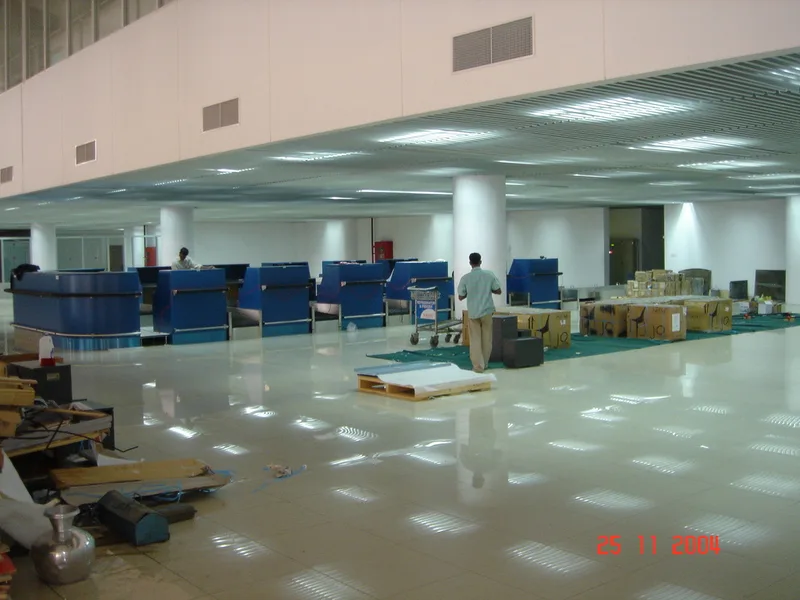 Wide shot of terminal counters being installed – fibreglass fitout in progress